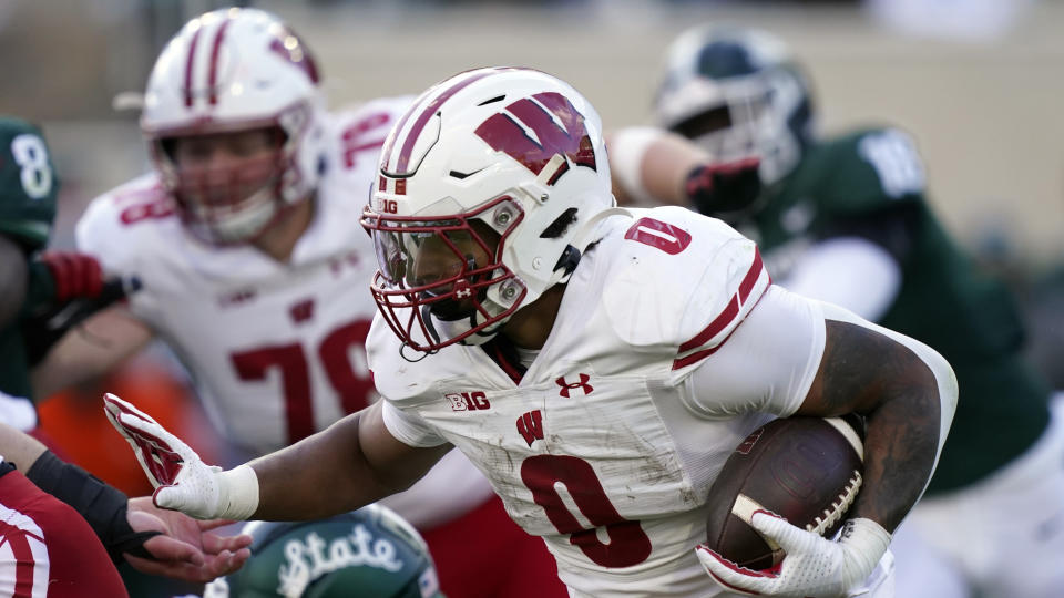 Wisconsin running back Braelon Allen plays during the first half of an NCAA college football game, Saturday, Oct. 15, 2022, in East Lansing, Mich. (AP Photo/Carlos Osorio)