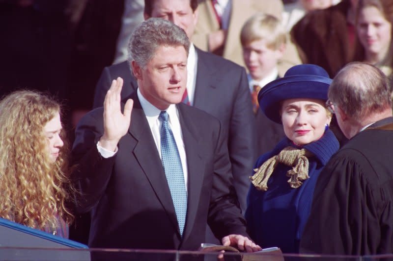 William Jefferson Clinton, flanked by his daughter, Chelsea Clinton, and wife, Hillary Rodham Clinton, is sworn in as president of the United States on January 20, 1993 on Capitol Hill. On November 3, 1992, U.S. voters elected Democrat Bill Clinton, the governor of Arkansas, to be president over incumbent George H.W. Bush. UPI File Photo