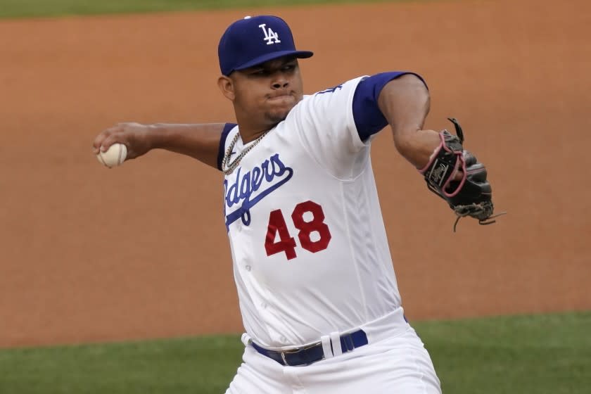 Los Angeles Dodgers starting pitcher Brusdar Graterol throws to a Houston Astros batter during the first inning of a baseball game in Los Angeles, Sunday, Sept. 13, 2020. (AP Photo/Alex Gallardo)