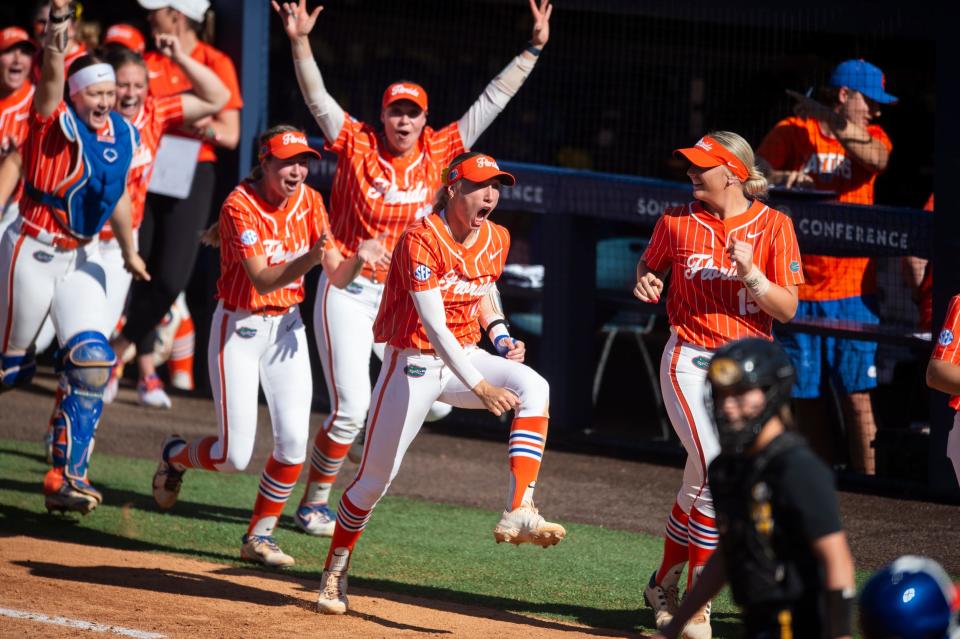 Florida Gators players celebrate a home run as Florida Gators and Missouri Tigers face of in the SEC softball tournament championship game at Jane B. Moore Field in Auburn, Ala., on Saturday, May 11, 2024.