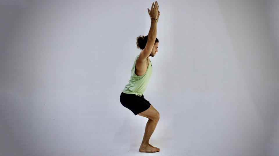 Chair pose demonstrated by Elisei Rusu