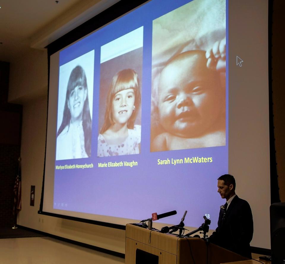 New Hampshire Senior Assistant Attorney General Jeffery Strelzin shows a slide of the three identified victims, Marlyse Honeychurch, left, and her daughters Marie Elizabeth Vaughn and Sarah Lynn McWaters at a press conference at the Department of Safety auditorium on Thursday, June 6, 2019 in Concord. (Michael Pezone/The Concord Monitor via AP)