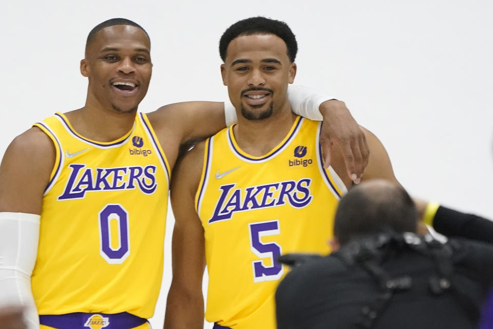 Los Angeles Lakers guard Russell Westbrook, left, takes a photo with Talen Horton-Tucker (5) during the NBA basketball team's Media Day Tuesday, Sept. 28, 2021, in El Segundo, Calif. (AP Photo/Marcio Jose Sanchez)