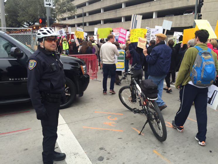 Protesters voiced their displeasure with President Trump on Saturday in Houston, site of Super Bowl LI. (Eric Adelson/Yahoo Sports) 