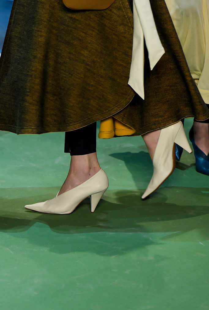 Geometric white leather pumps with inverted triangle heels, pointy toes and a V-shaped front, from the fall ’16 collection.<cite>Giovanni Giannoni/Fairchild.</cite>