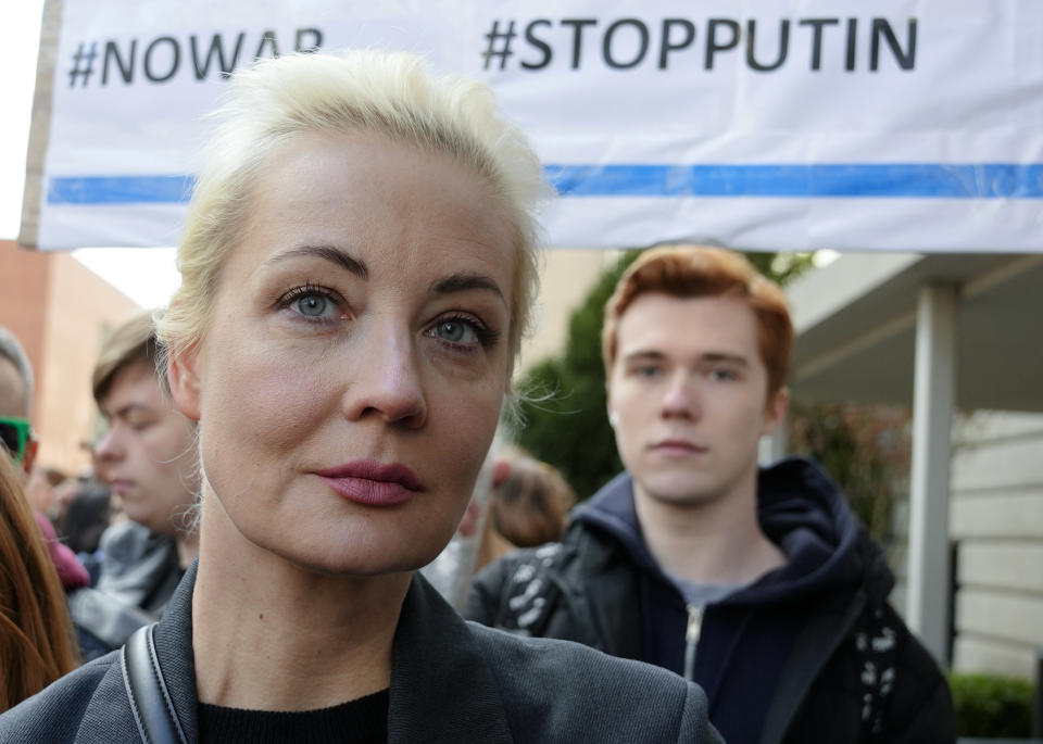 Yulia Navalnaya, centre, widow of Alexey Navalny, stands in a queue with other voters at a polling station near the Russian embassy in Berlin, after noon local time, on Sunday, March 17, 2024. The Russian opposition has called on people to head to polling stations at noon on Sunday in protest as voting takes place on the last day of a presidential election that is all but certain to extend President Vladimir Putin's rule after he clamped down on dissent. AP can't confirm that all the voters seen at the polling station at noon were taking part in the opposition protest. (AP Photo/Ebrahim Noroozi)
