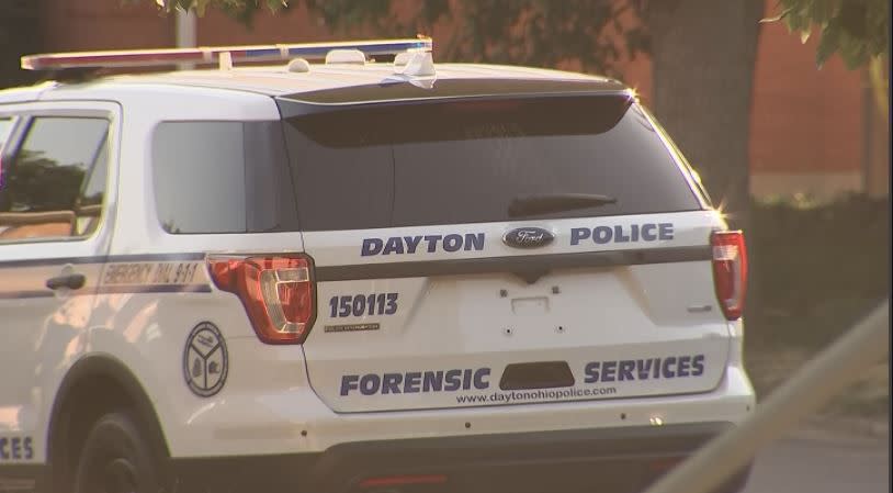 Dayton police investigate a shooting that left a man dead and sent four others to area hospitals Sunday on Superior Avenue. (Nate Russell/Staff)