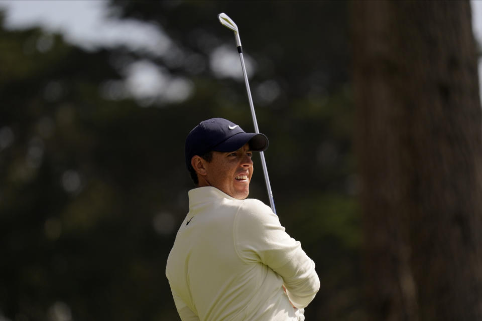 Rory McIlroy of Northern Ireland, watches his tee shot on the eighth hole during the second round of the PGA Championship golf tournament at TPC Harding Park Friday, Aug. 7, 2020, in San Francisco. (AP Photo/Jeff Chiu)