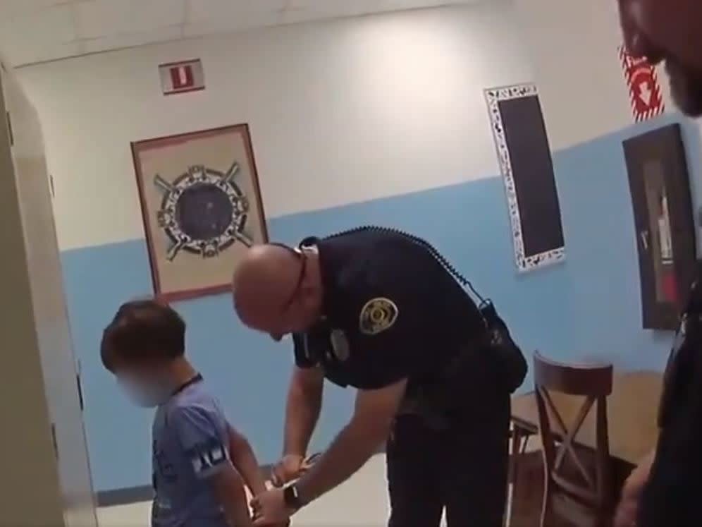 A police officer in Key West, Florida arrests an 8-year-old boy with special needs after he punched a teacher in the chest: Key West Police Department