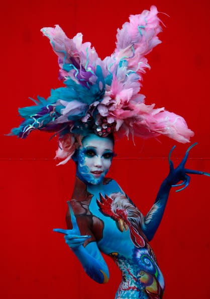 A model participates in a 2012 International Bodypainting Festival Asia at Duryu park on September 1, 2012 in Daegu, South Korea. The festival is the largest event in the field of body painting and spreads the art form to thousands of interested visitors each year. (Photo by Chung Sung-Jun/Getty Images)