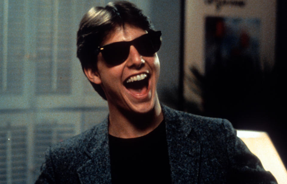 Tom Cruise laughs in a scene from the film 'Risky Business', 1983.