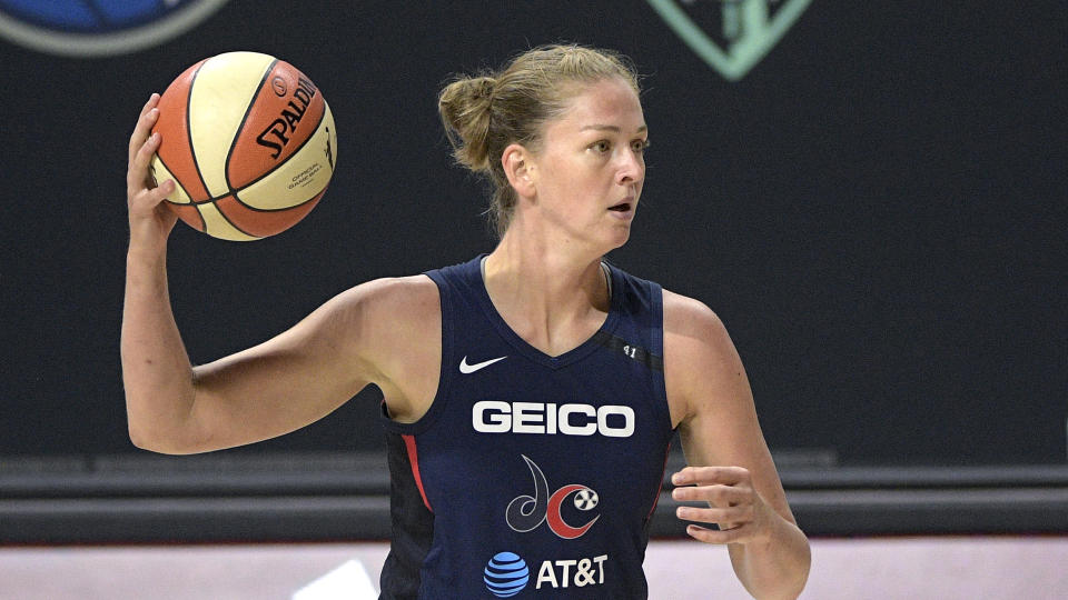 Washington Mystics guard Emma Meesseman sets up a play during the first half of a WNBA basketball first round playoff game against the Phoenix Mercury, Tuesday, Sept. 15, 2020, in Bradenton, Fla. (AP Photo/Phelan M. Ebenhack)