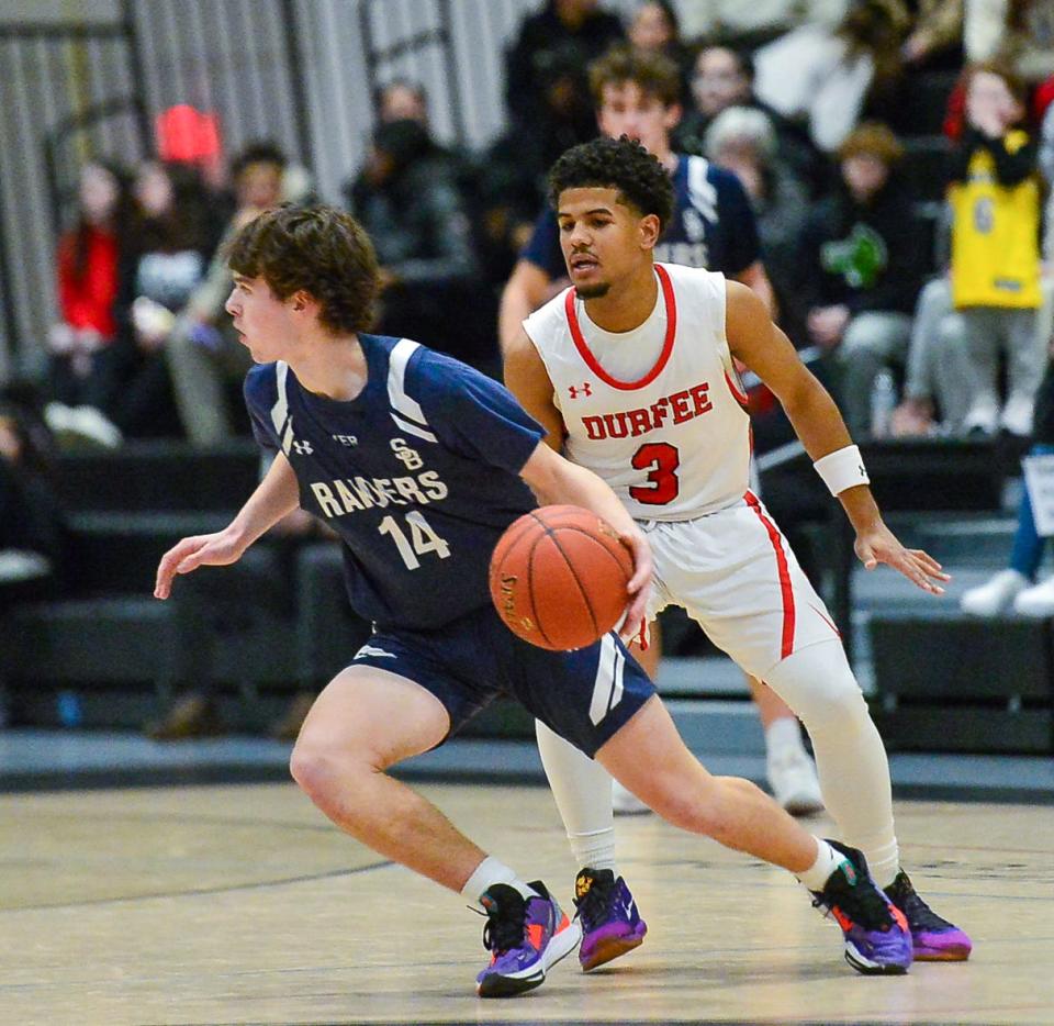 Durfee’s Jeyden Espinal guards Berkley’s Brendan McDonald during a recent game.