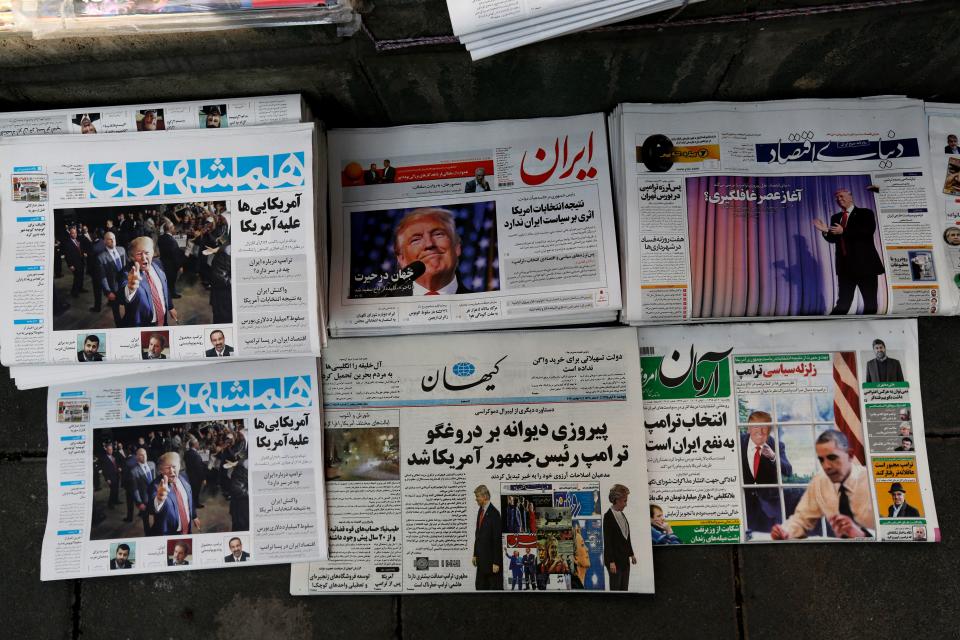 A picture taken on Nov. 10, 2016 in the Iranian capital Tehran shows local newspapers displaying articles on US president-elect Donald Trump a day after his election. (Photo:  Atta Kenare/AFP/Getty Images)