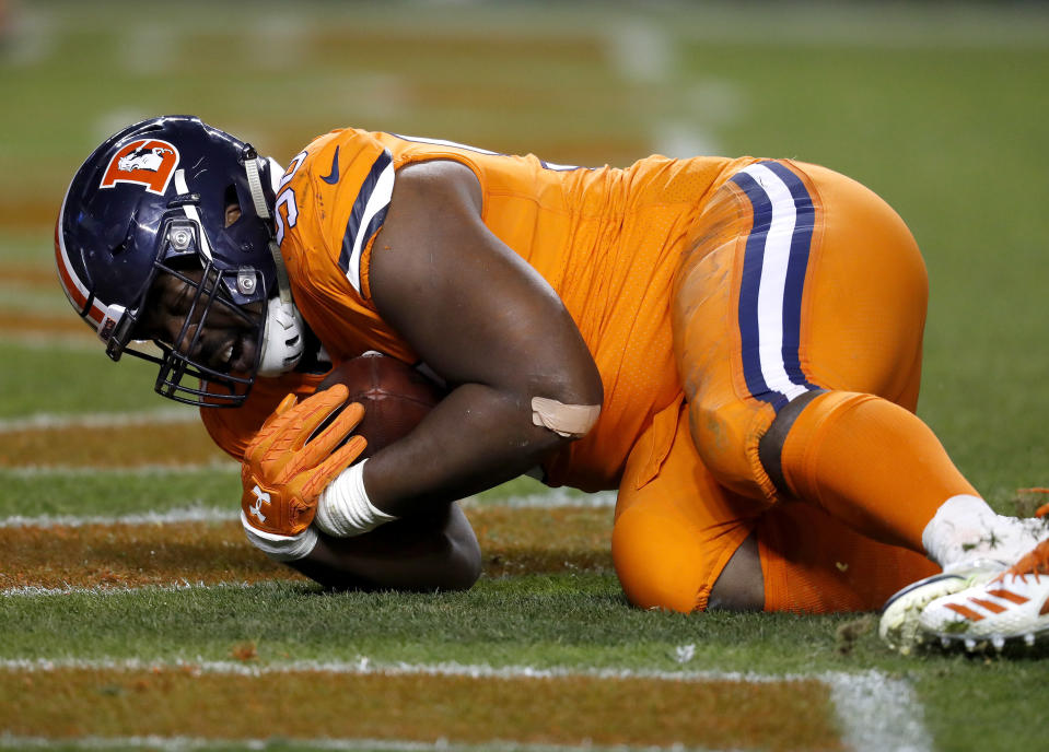 Denver Broncos defensive end Shelby Harris (96) intercepts a pass in the end zone against the Pittsburgh Steelers during the second half of an NFL football game, Sunday, Nov. 25, 2018, in Denver. (AP Photo/David Zalubowski)