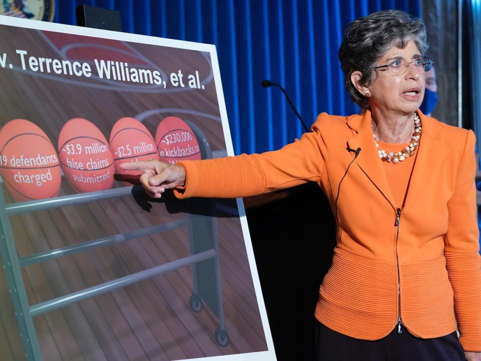 United States Attorney for the Southern District of New York Audrey Strauss points to graphic detailing how Terrence Williams led a scheme to defraud the the NBA Players' Health and Welfare Benefit Plan.