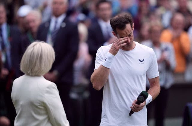 Andy Murray, right, wipes away tears before reminiscing with Sue Barker