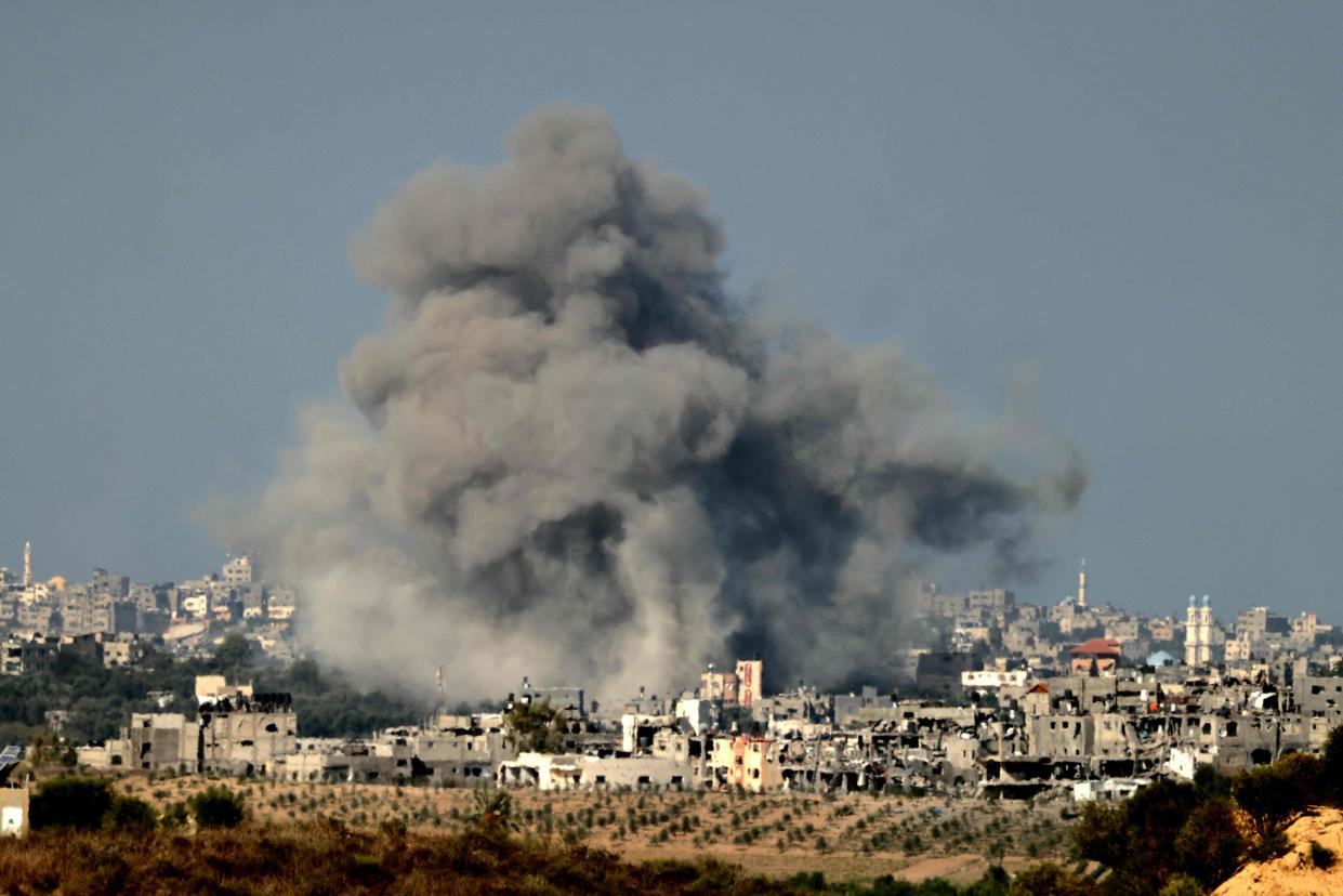 A picture taken from the southern Israeli city of Sderot on October 20, 2023, shows smoke ascending over the northern Gaza Strip following an Israeli strike, amid the ongoing battles between Israel and the Palestinian group Hamas.