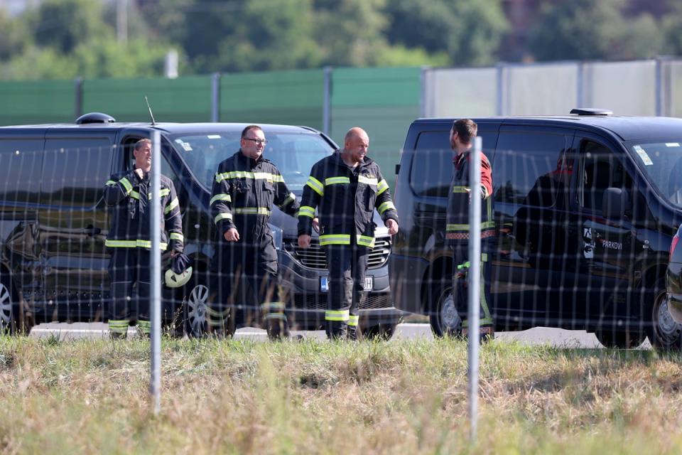 Rescuers at the crash scene in Podvorec, near Zagreb (AP)