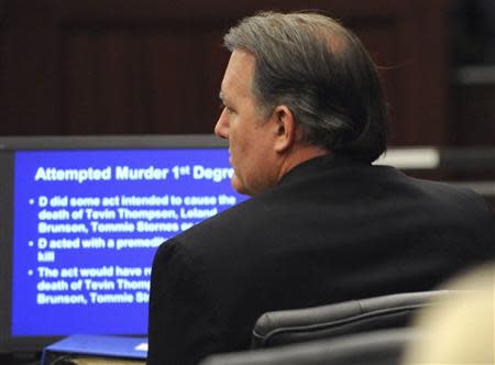 Michael Dunn sits in the courtroom during closing arguments at his murder trial in the shooting death of unarmed teen Jordan Davis, in Jacksonville, Florida February 12, 2014. REUTERS/Bob Mack/Pool