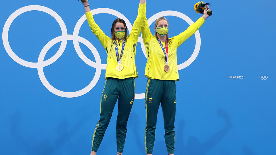 Kaylee McKeown and Emily Seebohm, pictured here on the podium during the medal ceremony. 