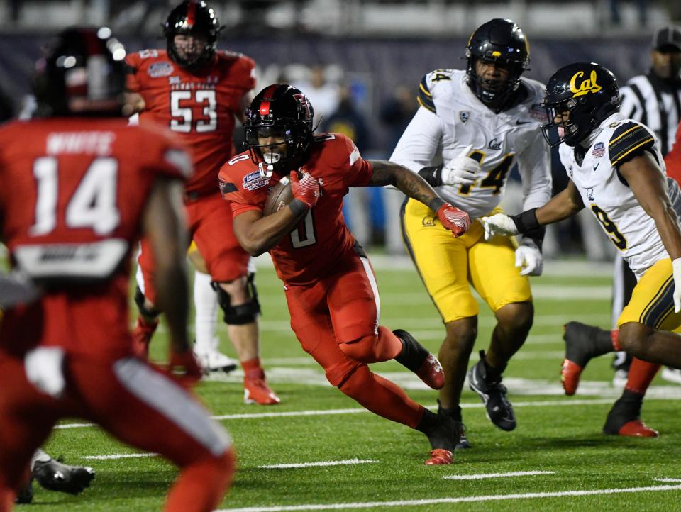 Texas Tech running back Cam'Ron Valdez carries the ball during the Red Raiders' 34-14 victory over California on Saturday at the Independence Bowl in Shreveport, Louisiana. Valdez announced Monday he's having his name withdrawn from the NCAA transfer portal.