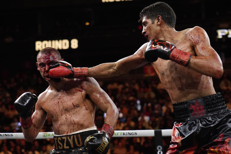 Sebastian Fundora hits Tim Tszyu, of Australia in a super welterweight title bout Saturday, March 30, 2024, in Las Vegas. (AP Photo/John Locher)