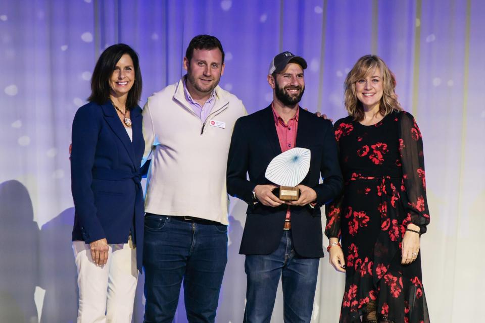 Fuel & Iron Developers Zach Cytryn (second from left) and Nathan Stern are recognized by members of the Colorado Business Commitee for the Arts for their work in supporting the arts.