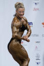<div class="caption-credit"> Photo by: Tomas Hudcovic/isifa/Getty Images</div><p> The darker, more bronzed the tan, the sharper the muscle striations appear. That may win points with the judges, but a mismatched face blows it with audience members. "Even if neck down there's a body judges are looking for, if your face doesn't match your tan that's going to work against you," says Colbert. </p>