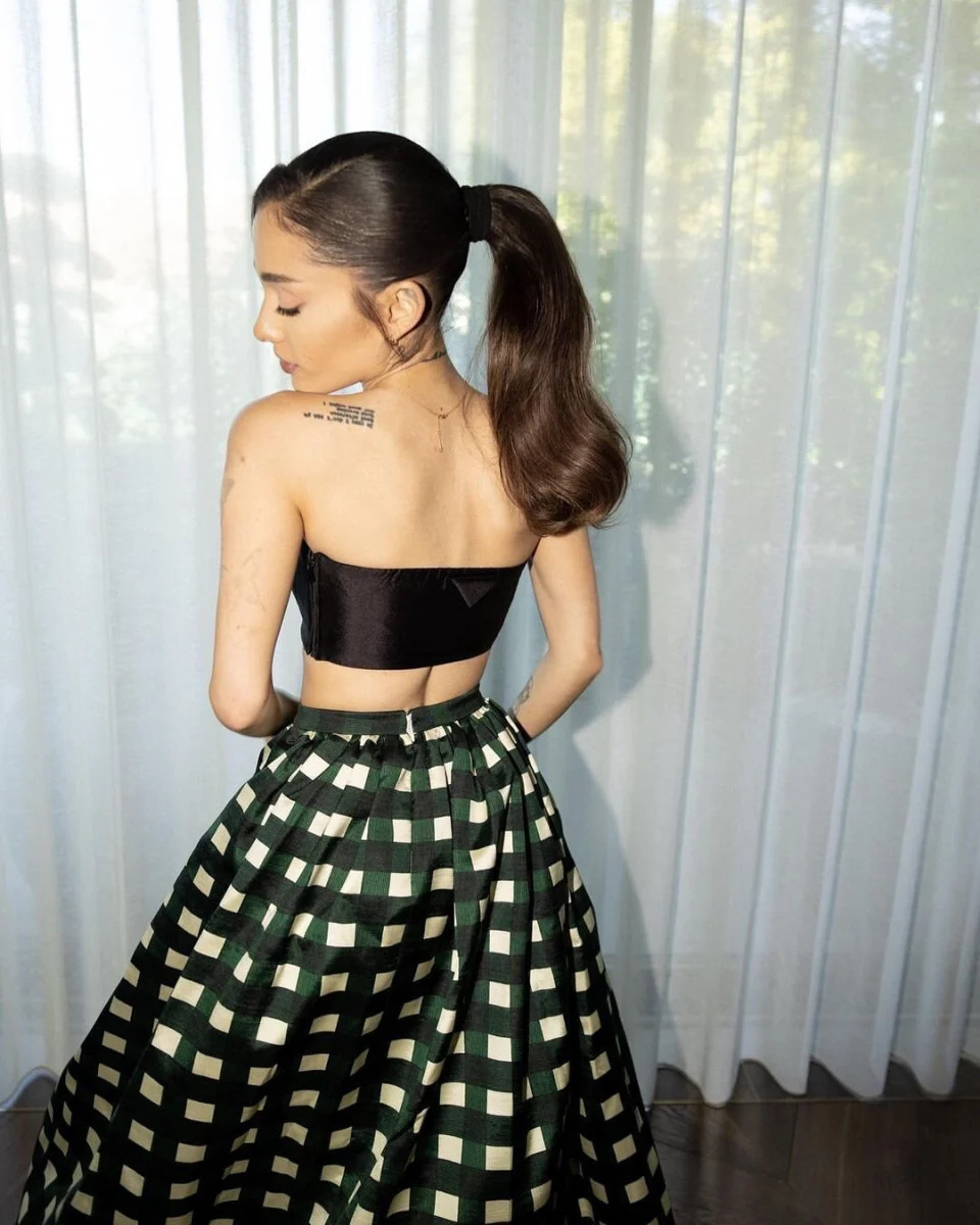 Ariana Grande Instagram post prada skirt