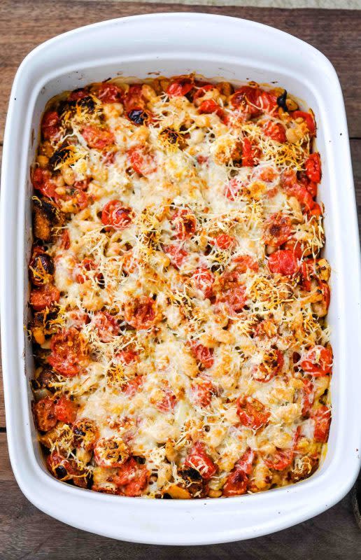 <p>Healthy Christian Home</p><p>Sweet cherry tomatoes, gooey cheese, fresh basil, white beans, toasted wholemeal bread—it’s like a savory bread pudding!</p><p><strong>Get the recipe: </strong><a href="https://healthychristianhome.com/savory-cheesy-tomato-casserole/" rel="nofollow noopener" target="_blank" data-ylk="slk:Tomato Casserole;elm:context_link;itc:0;sec:content-canvas" class="link "><strong>Tomato Casserole</strong></a></p>