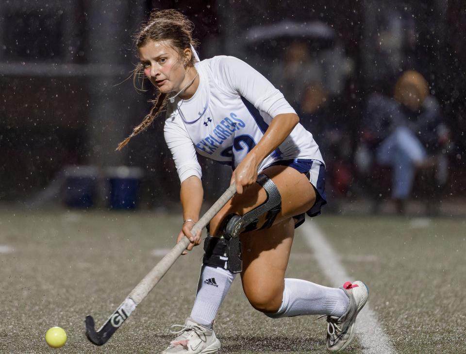 Hudson's Lexi St. Pierre clear a ball from the defensive end in a field hockey match against Hathaway Brown on Thursday, Oct. 19, 2023, in Hudson.