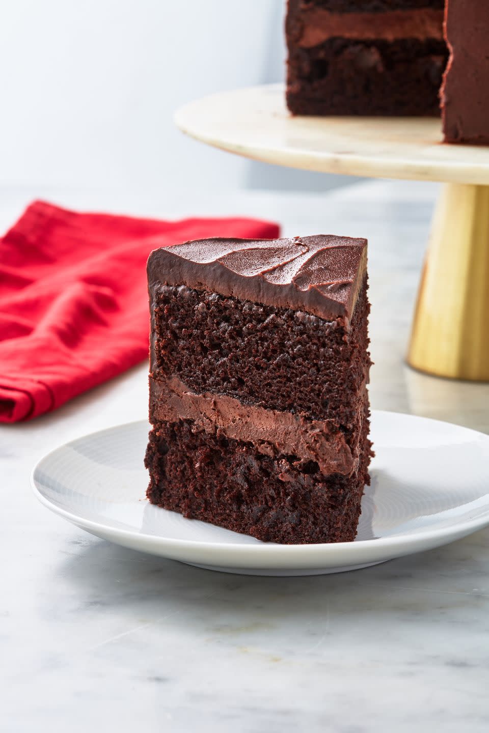 <p>Thanks to a couple of smart swaps and a special ingredient or two, we bet you might not even be able to guess this <a href="https://www.delish.com/cooking/a27750610/homemade-chocolate-cake-recipe/" rel="nofollow noopener" target="_blank" data-ylk="slk:chocolate cake;elm:context_link;itc:0;sec:content-canvas" class="link ">chocolate cake</a> is completely egg- and dairy-free (meaning it’s perfect for when you’re low on ingredients too)</p><p>Get the <strong><a href="https://www.delish.com/cooking/recipe-ideas/a28761548/vegan-chocolate-cake-recipe/" rel="nofollow noopener" target="_blank" data-ylk="slk:Vegan Chocolate Cake recipe;elm:context_link;itc:0;sec:content-canvas" class="link ">Vegan Chocolate Cake recipe</a></strong>.</p>