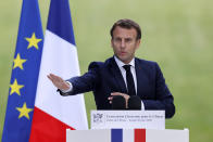 French President Emmanuel Macron delivers his speech during a meeting with members of the Citizens' Convention on Climate to discuss over environment proposals at the Elysee Palace in Paris, Monday, June 29, 2020. French President Emmanuel Macron, who once declared "Make The Planet Great Again" but whose climate agenda got knocked off course by persistent street protests, is under new pressure to fight climate change after the Green Party did well in Sunday's local elections. (Christian Hartmann/Pool via AP)