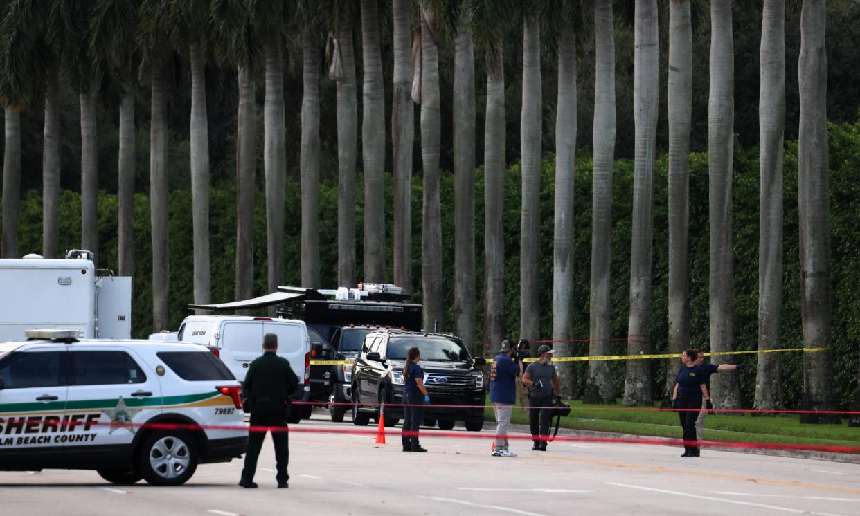 <span>Law enforcement outside the Trump International Gold Club, Palm Beach, Florida.</span><span>Photograph: Marco Bello/Reuters</span>