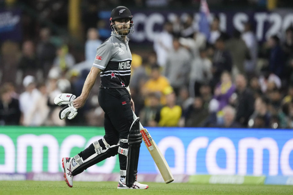 New Zealand's Kane Williamson walks from the field after he was dismissed during the T20 World Cup cricket match between Australia and New Zealand in Sydney, Australia, Saturday, Oct. 22, 2022. (AP Photo/Rick Rycroft)