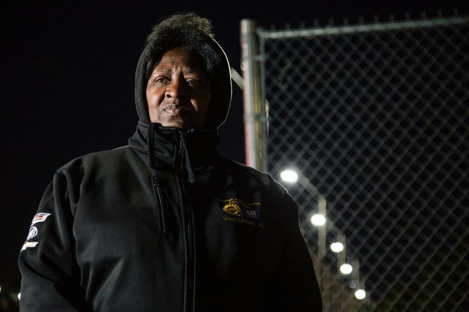 Striker Linda Crooks, 65, of Southfield, a sander on the line pickets outside of GM Detroit-Hamtramck Assembly Tuesday, Oct. 22, 2019.
