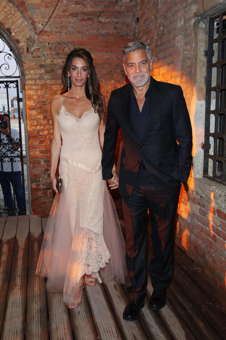Amal Clooney and George Clooney attend the Venice Film Festival on August 31, 2023.