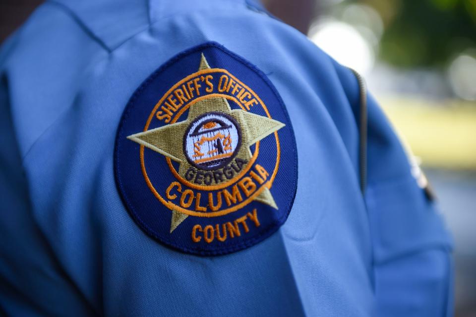 FILE - A Columbia County Sheriff's office badge at the Columbia County Sheriff's Substation in Evans, Ga., on Monday, Sept. 19, 2022.