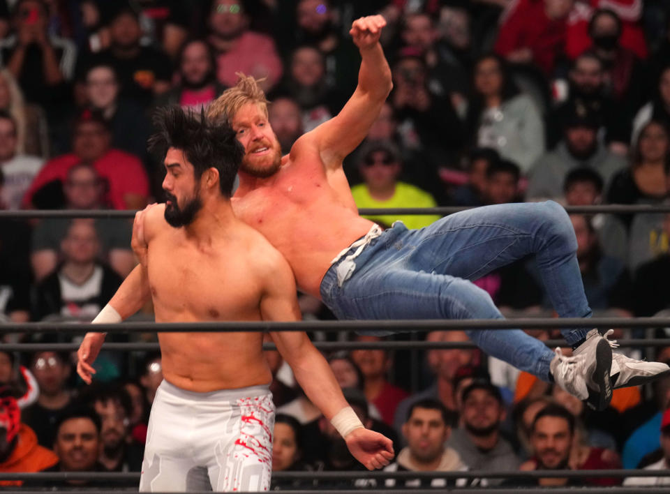 AEW All Atlantic Champion Orange Cassidy (jeans) and Wheeler Yuta (white pants) during AEW Dynamite at Footprint Center.