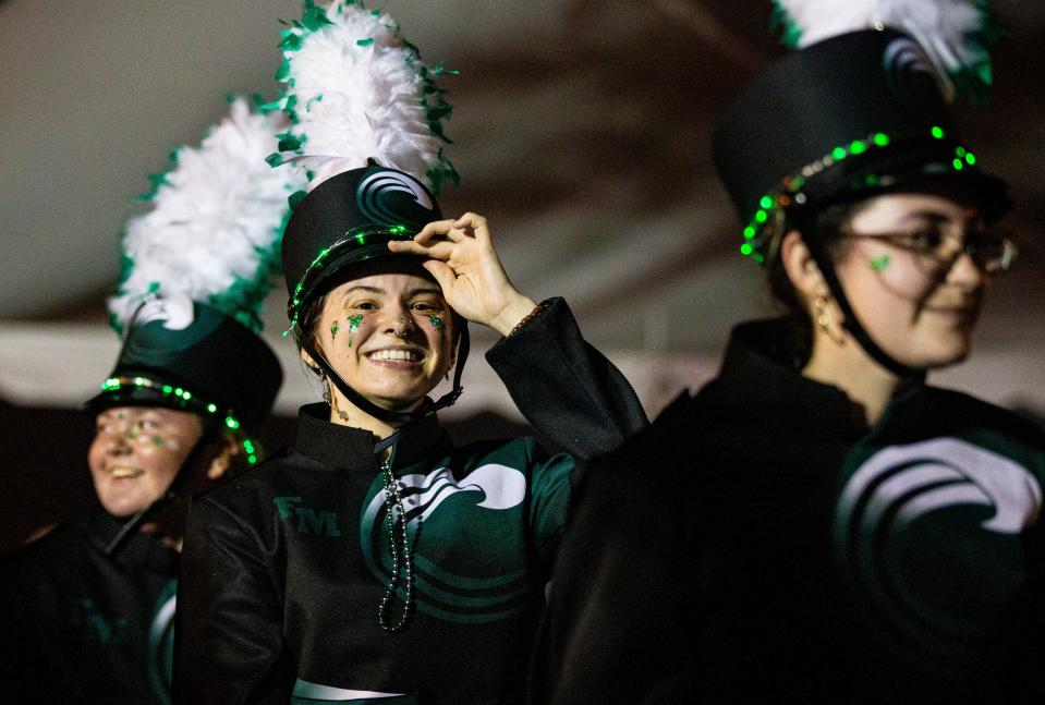 Members of the Fort Myers High School marching band take part in the 2024 Edison Festival of Light Grand Parade in downtown Fort Myers on Saturday, Feb. 17, 2024.