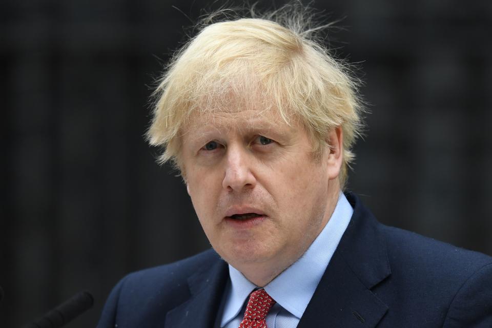 Britain's Prime Minister Boris Johnson gives a statement in Downing Street in central London on April 27, 2020 after returning to work following more than three weeks off after being hospitalised with the COVID-19 illness. - British Prime Minister Boris Johnson returns to work on Monday more than three weeks after being hospitalised with the novel coronavirus and spending three days in intensive care. Johnson, one of the highest-profile people to have contracted the virus, returned to 10 Downing Street on Sunday evening. (Photo by DANIEL LEAL-OLIVAS / AFP) (Photo by DANIEL LEAL-OLIVAS/AFP via Getty Images)