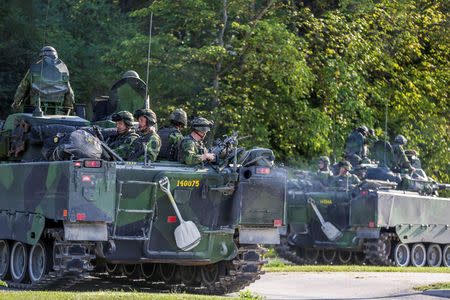 Swedish armoured personnel carriers are seen in Visby harbour, island of Gotland, Sweden September 14, 2016. TT News Agency/ Soren Andersson/ via REUTERS