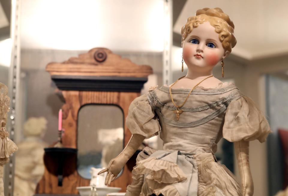 A Parian-style bisque doll from the late 1800s is on display at the Doll Museum in Worthington. The German-made doll's clothes were crafted by Mabel Chandler, whose collection is part of the museum.