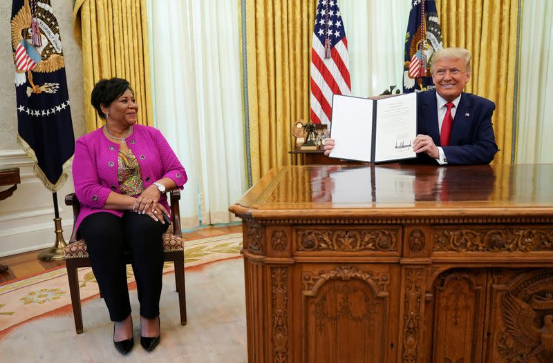 Trump pardons Alice Johnson at the White House in Washington