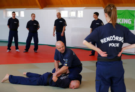Hungarian border hunter recruits learn judo moves during a training near the border crossing point in Barcs, Hungary March 8, 2017. REUTERS/Laszlo Balogh