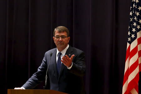 U.S. Secretary of Defense Ash Carter speaks during a joint news conference with Japan's Defense Minister Gen Nakatani (not pictured) at the defense ministry in Tokyo April 8, 2015. REUTERS/Thomas Peter