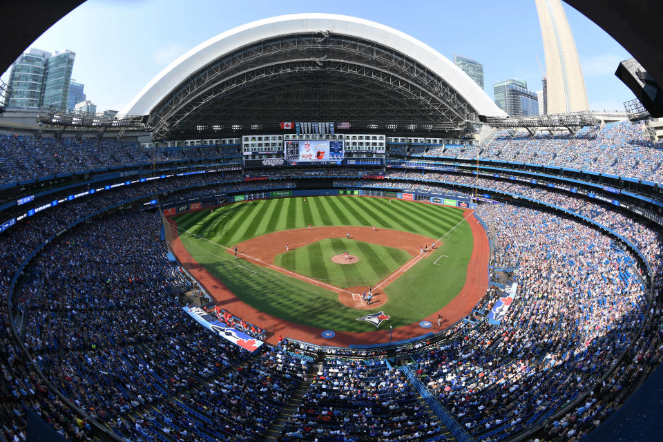 Rogers Centre is at the base of the CN Tower.