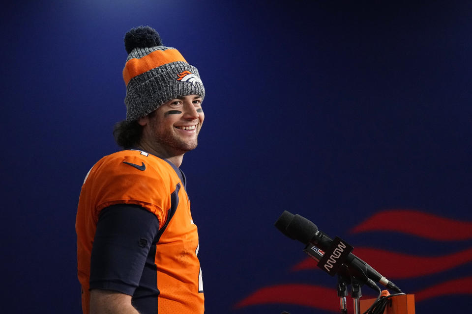 Denver Broncos quarterback Jarrett Stidham smiles during a news conference following a win against the Los Angeles Chargers during an NFL football game, Sunday, Jan. 31, 2023, in Denver. (AP Photo/Jack Dempsey)