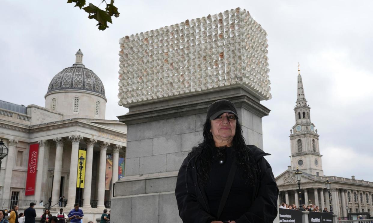 <span>Echoes of an Aztec masterpiece … Margolles poses in front of Mil Veces un Instante (A Thousand Times in an Instant).</span><span>Photograph: Kin Cheung/AP</span>